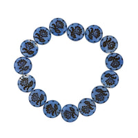 Blue Czech Glass Coin Beads with Daisy Flower Design, Blue Silk with Black Wash, 18mm, a full strand photographed on white background demonstrating the variation